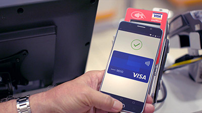 Man making payment via mobile