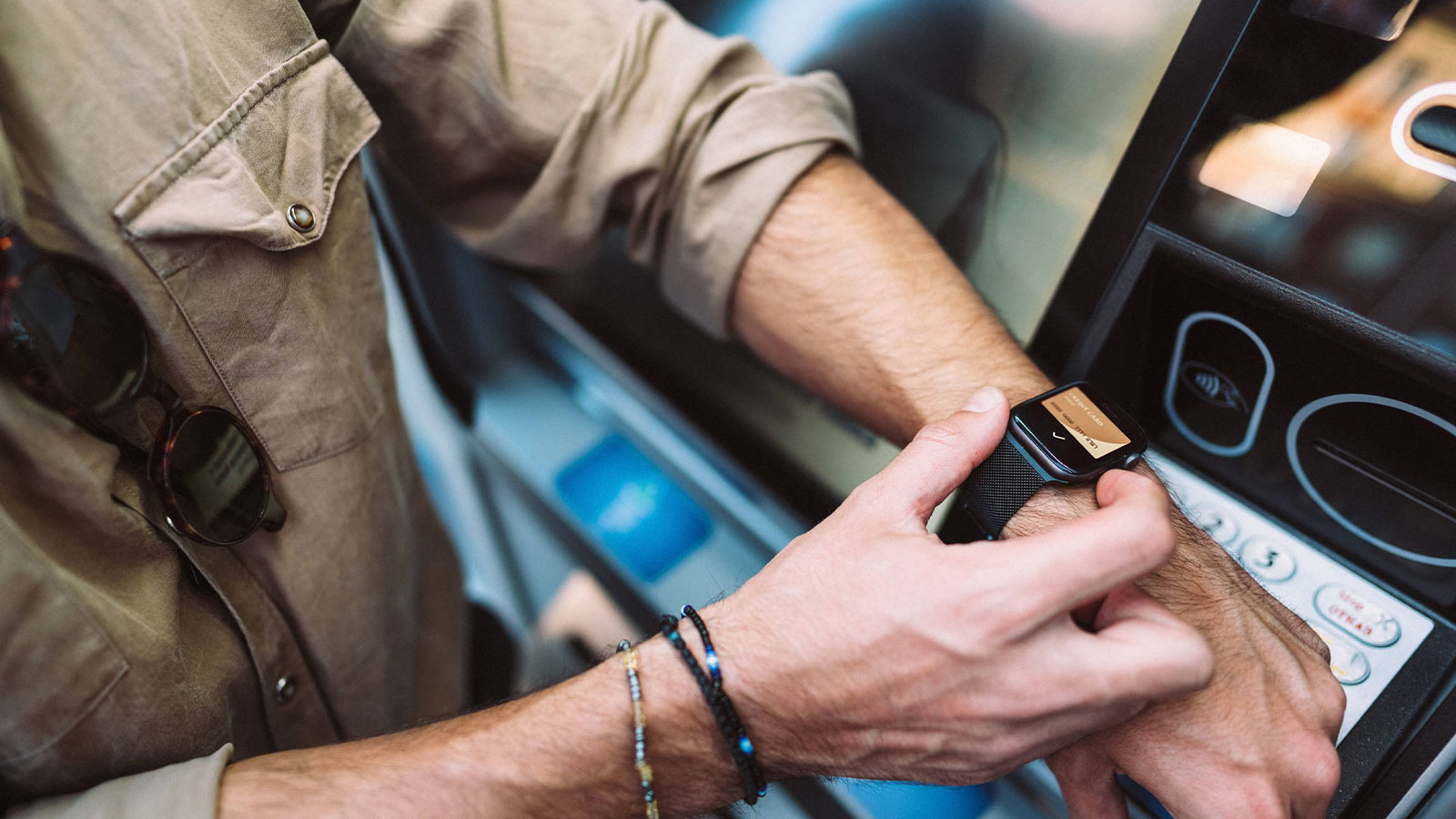 Man making a transaction with smartwatch