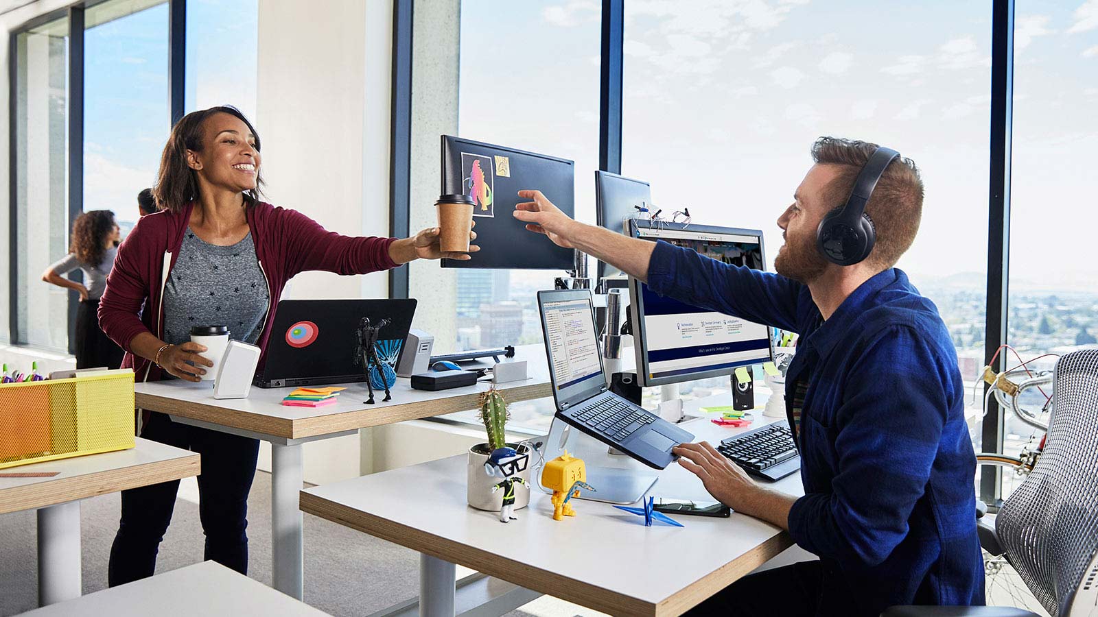 Employees sharing a drink